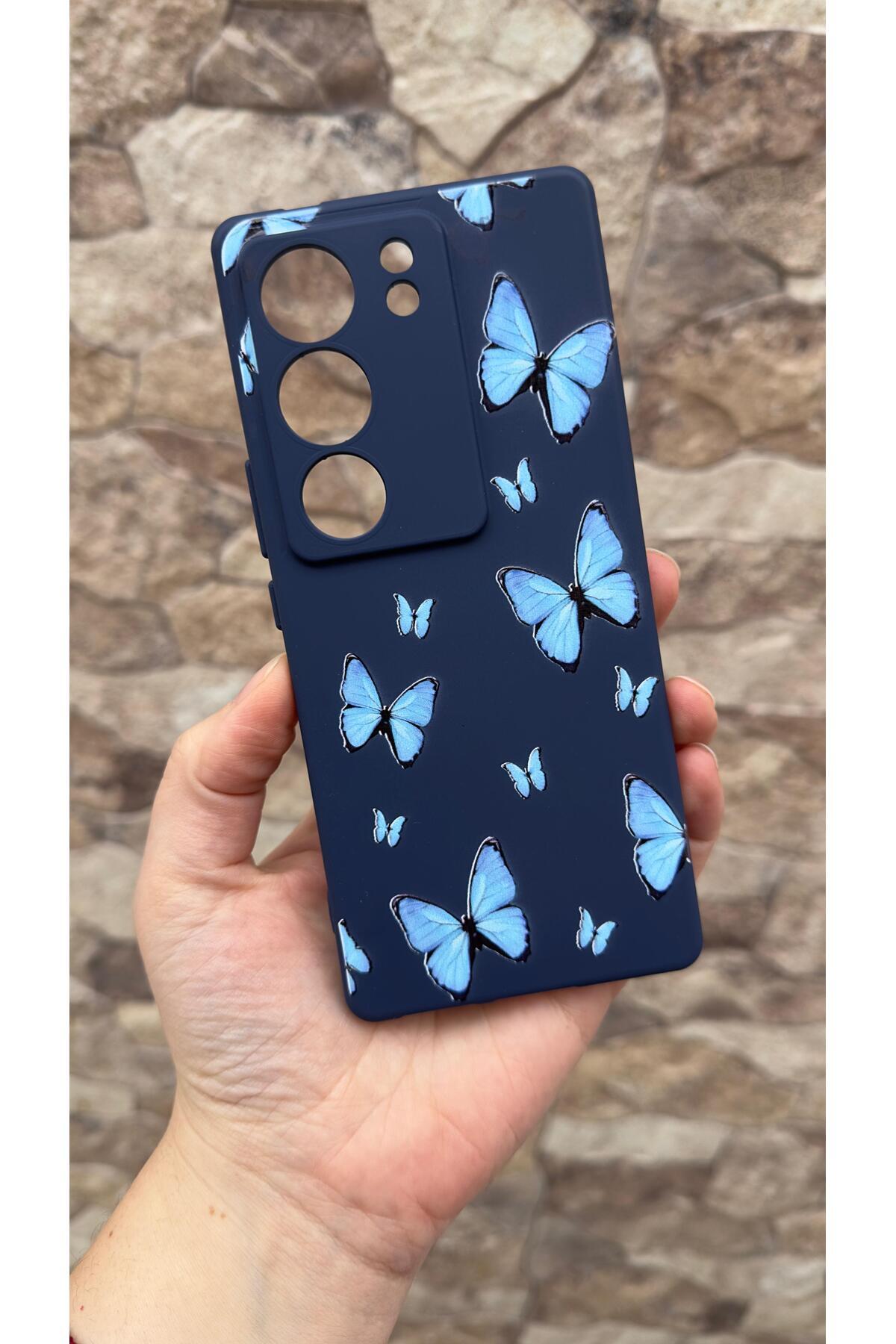 VİVO V29 Uyumlu Mavi Kelebek Desenli Silikon Darbe Emici Klasik Korumalı Rubber Kılıf